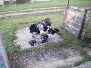  paintball player in hideout 